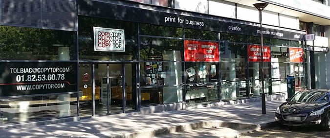Vitrine imprimeur COPY-TOP Paris | agence Tolbiac Bibliothèque