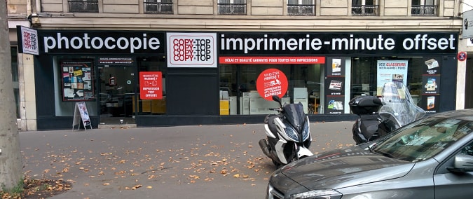 Vitrine imprimeur COPY-TOP Paris | agence Grande Armée - Maillot
