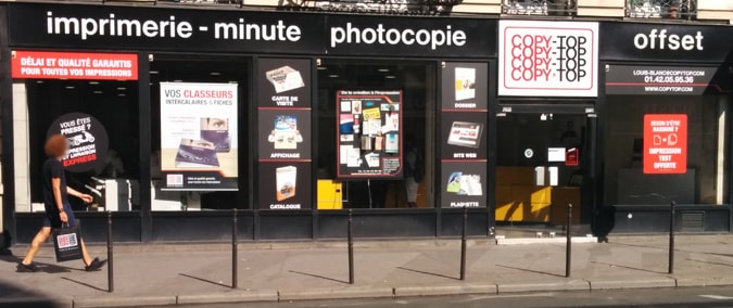Vitrine imprimeur COPY-TOP Paris | agence Louis Blanc - La Fayette