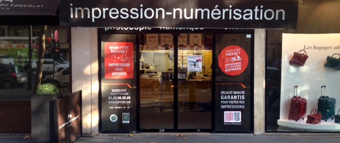 Vitrine imprimeur COPY-TOP Paris | agence Madeleine