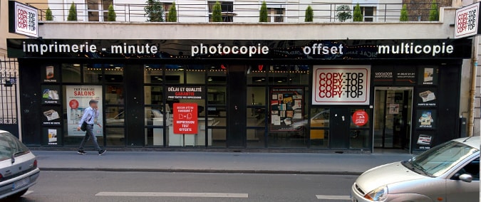 Vitrine imprimeur COPY-TOP Paris | agence Mogador - Trinité