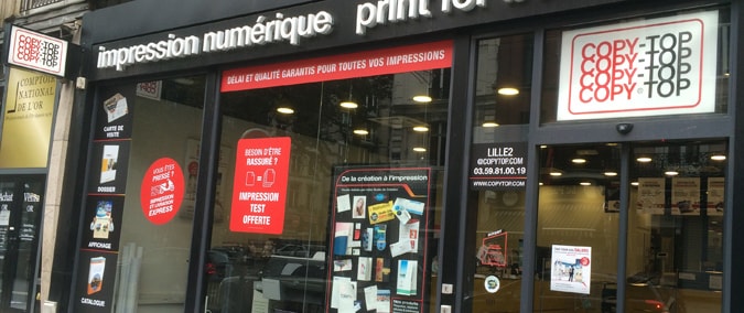 Vitrine imprimeur COPY-TOP Lille | agence Nationale - Liberté