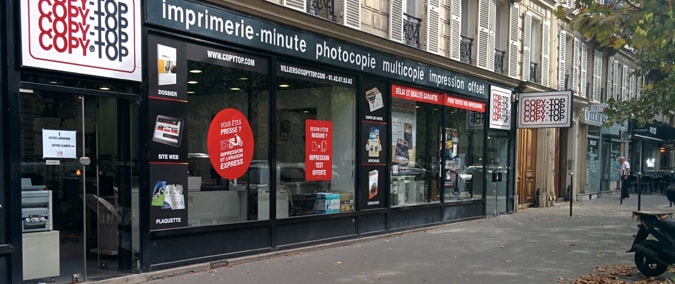 Vitrine imprimeur COPY-TOP Paris | agence Péreire - Wagram