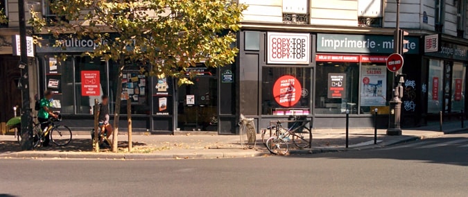 Vitrine imprimeur COPY-TOP Paris | agence Voltaire
